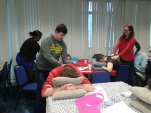 Teachers learning Peer Massage from Carole